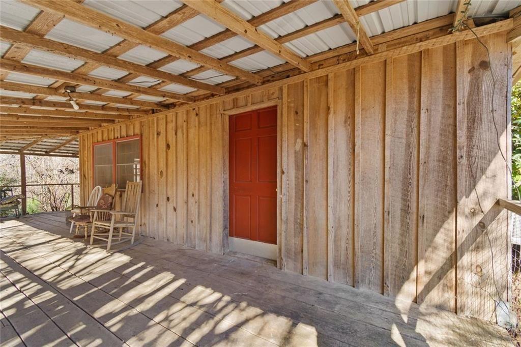 7315 Freeman Road Dawsonville, GA 30534 - Photo 14 of 28 a view of a room with wooden walls