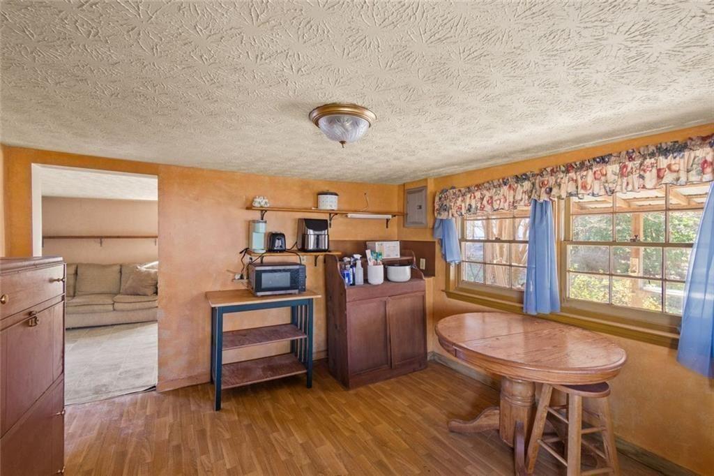 7315 Freeman Road Dawsonville, GA 30534 - Photo 19 of 28 a room with furniture and a window