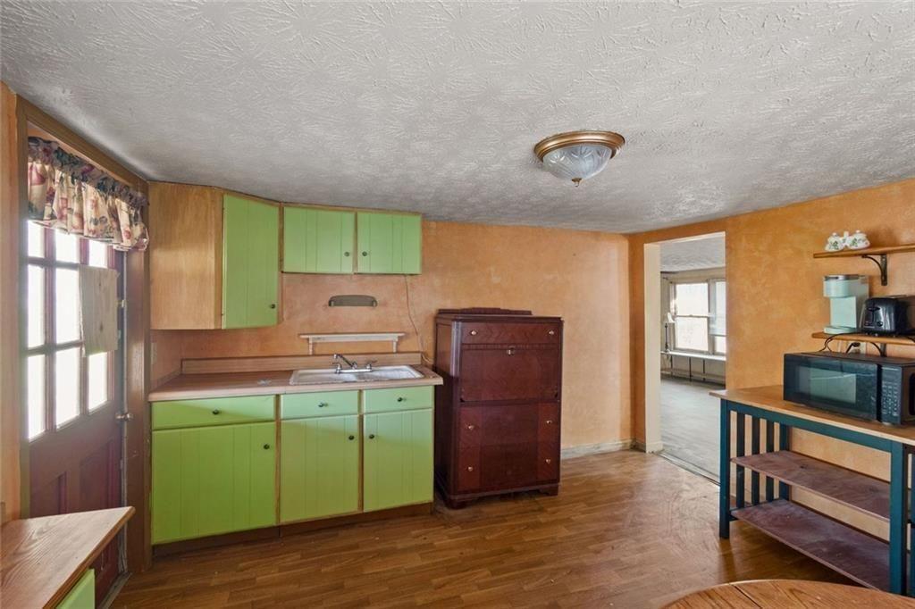 7315 Freeman Road Dawsonville, GA 30534 - Photo 20 of 28 a room with storage and utility