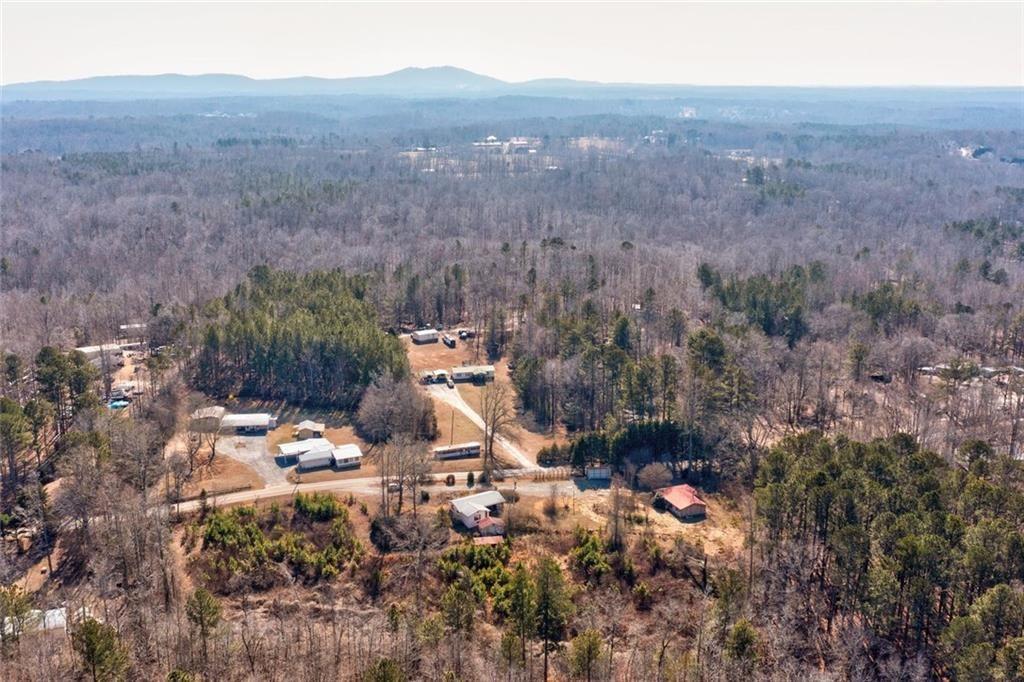 7315 Freeman Road Dawsonville, GA 30534 - Photo 5 of 28 a view of a houses with a yard