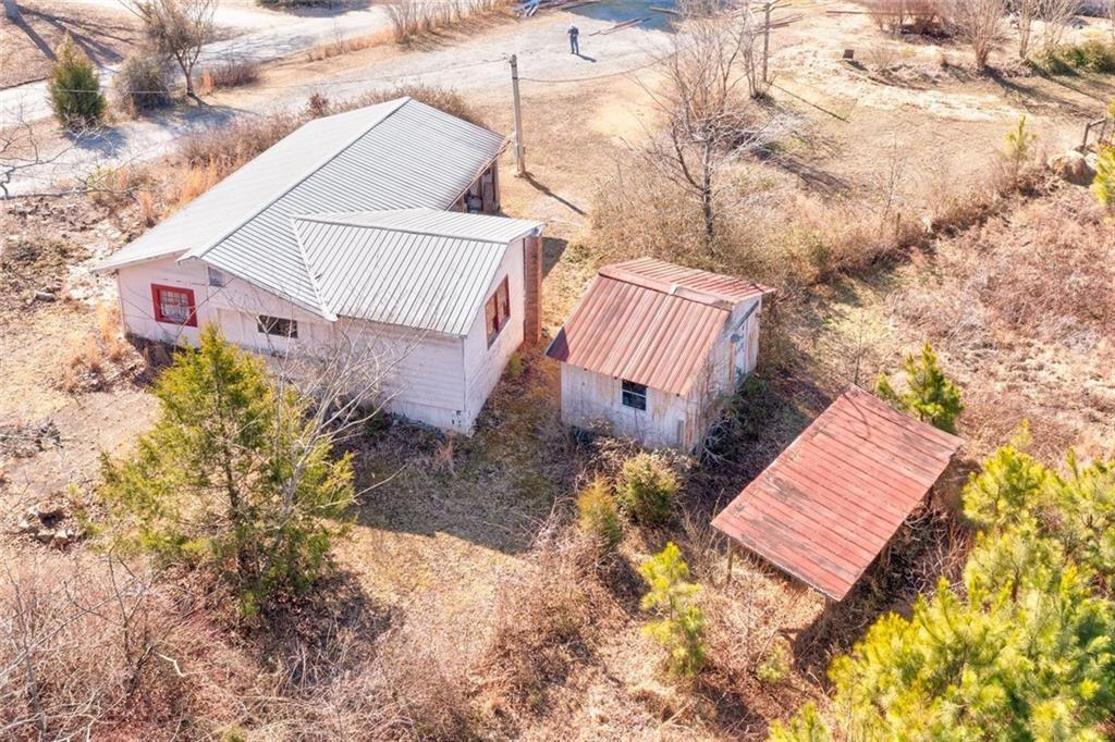 7315 Freeman Road Dawsonville, GA 30534 - Photo 7 of 28 a view of a back yard of the house