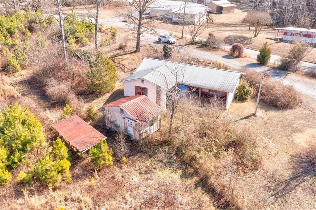 7315 Freeman Road Dawsonville, GA 30534 - Photo 8 of 28 a view of residential houses with outdoor space
