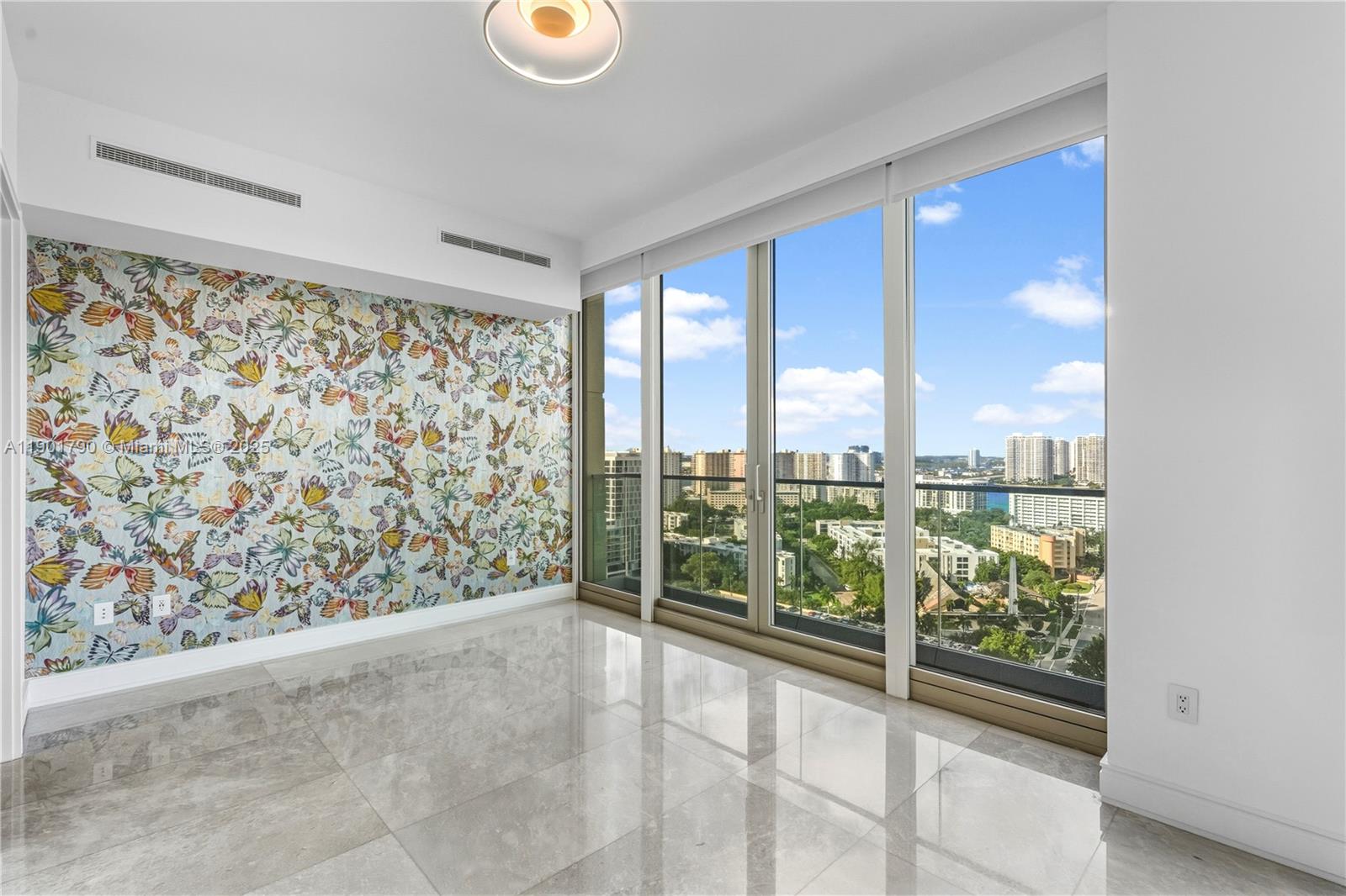17901 Collins Avenue, Unit 1803 Sunny Isles Beach, FL 33160 - Photo 28 of 57 a view of a city from a windows