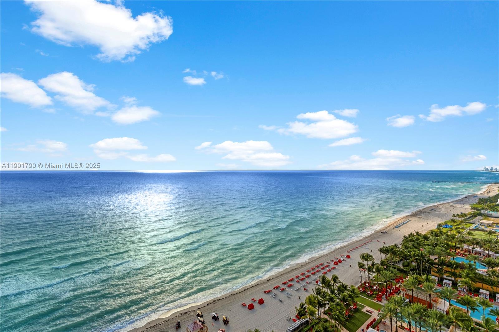 17901 Collins Avenue, Unit 1803 Sunny Isles Beach, FL 33160 - Photo 33 of 57 a view of an ocean from a balcony