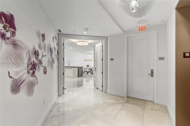 a bathroom with a shower and a sink