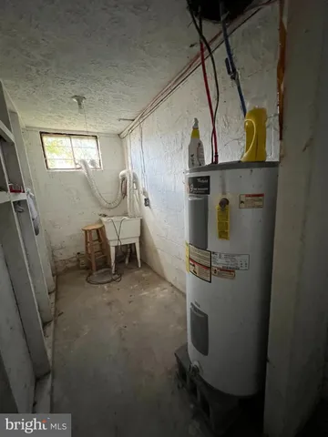 a view of an empty room and wooden floor