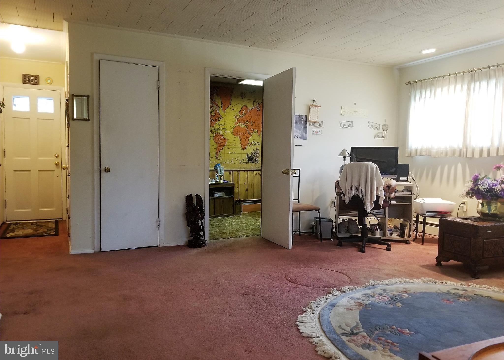 9 Red Berry Road Levittown, PA 19056 - Photo 36 of 44 Family Room office room clst & door to front patio