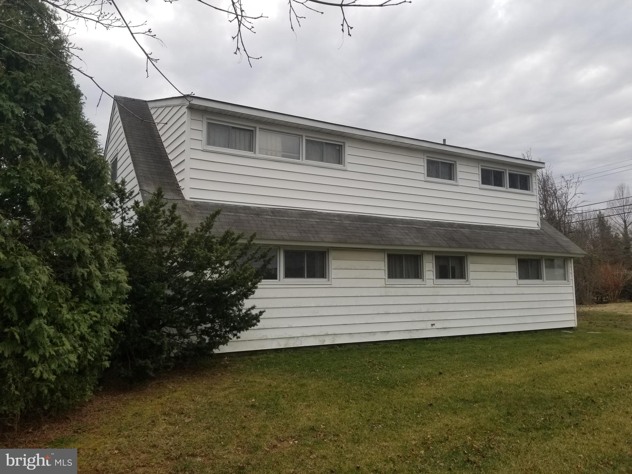 9 Red Berry Road Levittown, PA 19056 - Photo 40 of 44 Side facade - Full dormer