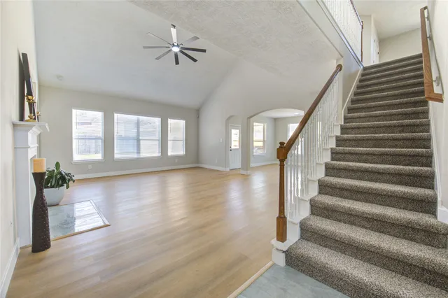 a view of an entryway with wooden floor