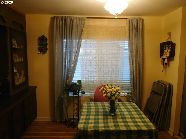 a kitchen with sink cabinets and window