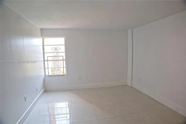 an empty room with a window