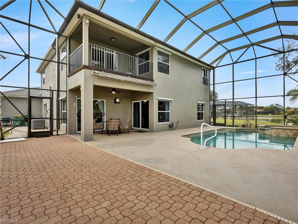 2941 Inlet Cove Lane East Naples, FL 34120 - Photo 16 of 50 a view of a house with a street