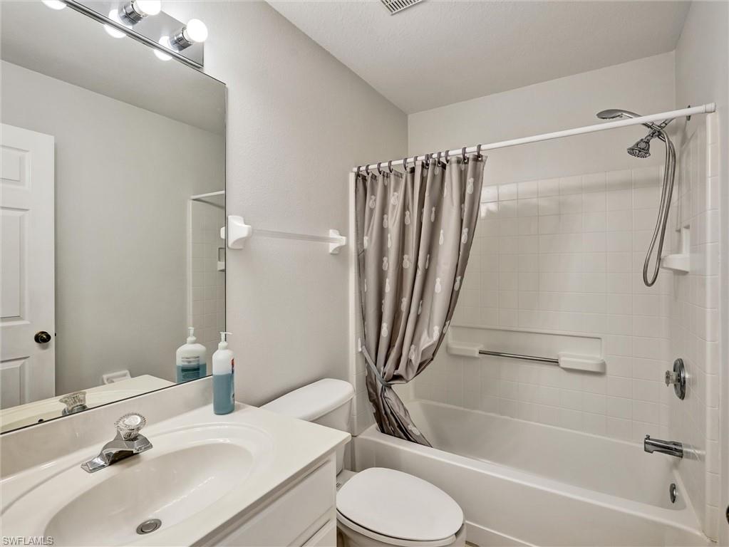 2941 Inlet Cove Lane East Naples, FL 34120 - Photo 34 of 50 a bathroom with a sink toilet and shower