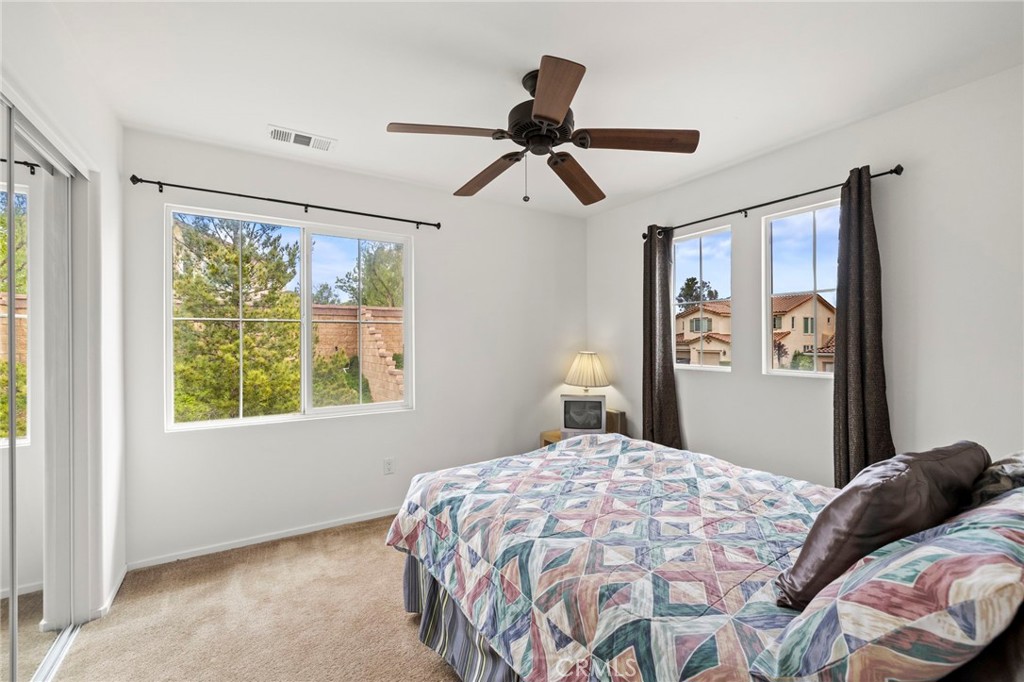 34072 Corktree Road Lake Elsinore, CA 92532 - Photo 25 of 53 Upstairs Room #2--Upgraded Mirrored Wardrobe & Ceiling Fan