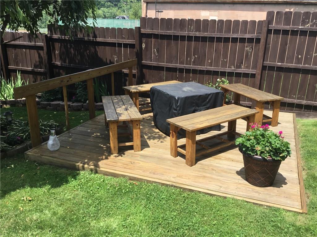 104 Sumner Avenue Vandergrift, PA 15690 - Photo 22 of 26 a view of a chairs and table in the backyard