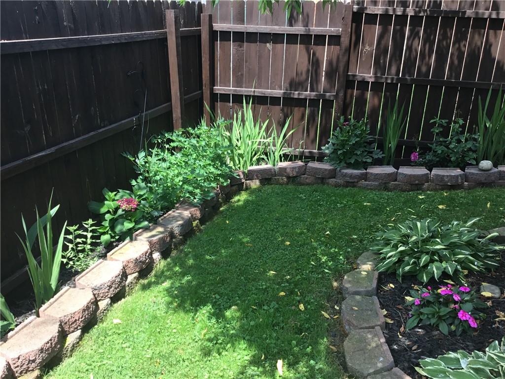 104 Sumner Avenue Vandergrift, PA 15690 - Photo 26 of 26 a garden with plants in front of it