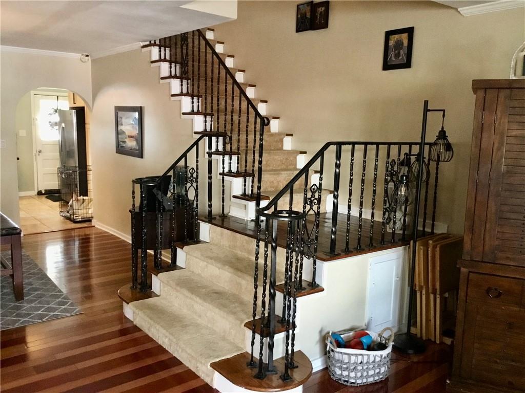 104 Sumner Avenue Vandergrift, PA 15690 - Photo 4 of 26 a view of entryway and hall with wooden floor