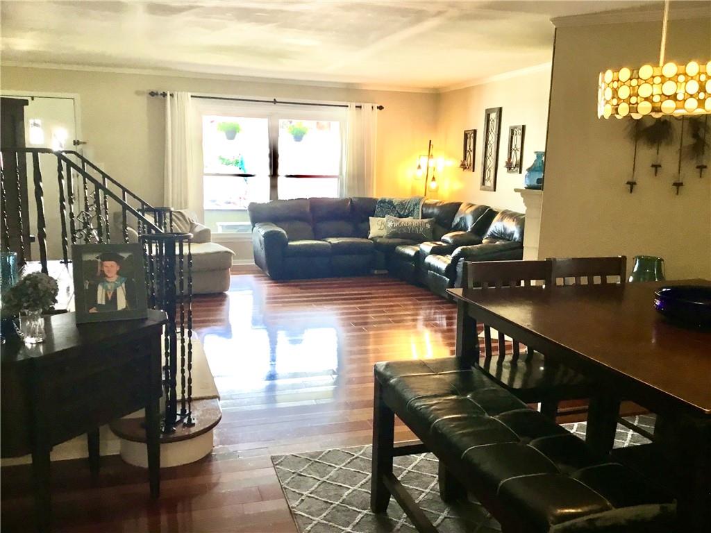104 Sumner Avenue Vandergrift, PA 15690 - Photo 9 of 26 a living room with furniture and wooden floor