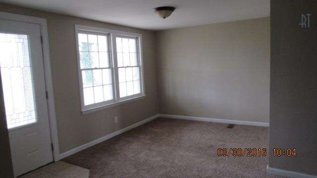 3490 Shouse Road Santa Fe, TN 38482 - Photo 12 of 13 SPECIOUS LIVING ROOM WITH CARPET AND DOUBLE WINDOWS