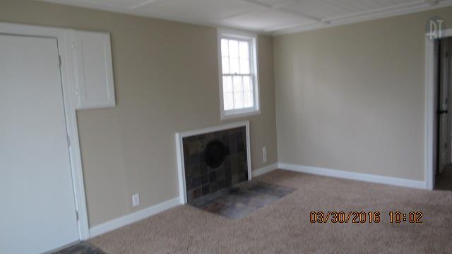3490 Shouse Road Santa Fe, TN 38482 - Photo 3 of 13 LARGE DEN WITH HEARTH AND VENT FOR WOOD HEATER AND CARPET ON THE FLOOR