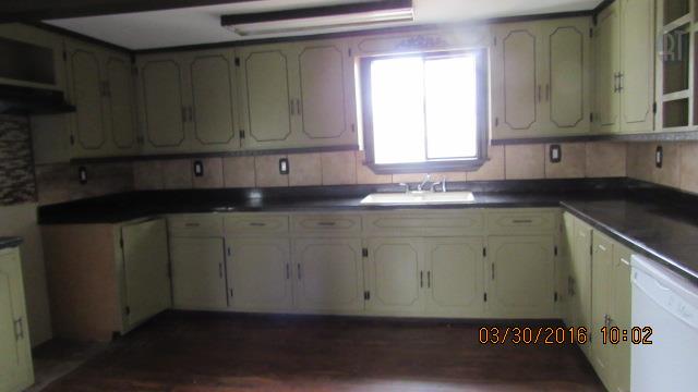 3490 Shouse Road Santa Fe, TN 38482 - Photo 6 of 13 KITCHEN WITH VINYL FLOOR AND LARGE WINDOW TO LOOK OUT OVER THE 3.37 ACRES