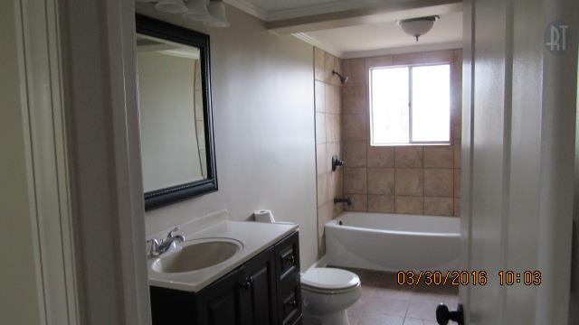 3490 Shouse Road Santa Fe, TN 38482 - Photo 8 of 13 BATHROOM WITH TILE WALL AROUND THE TUB AND TILE FLOOR