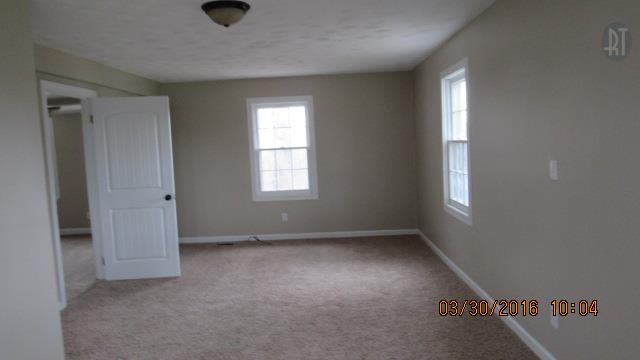 3490 Shouse Road Santa Fe, TN 38482 - Photo 10 of 13 SECOND BEDROOM WITH CARPET ON THE FLOOR