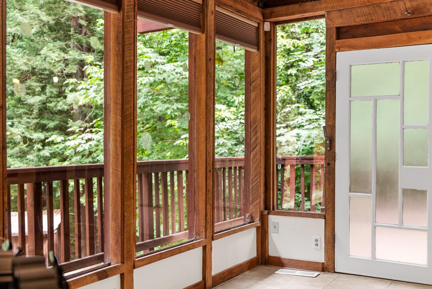 975 Logan Creek Road Boulder Creek, CA 95006 - Photo 13 of 41 a view of a porch with wooden floor and garden