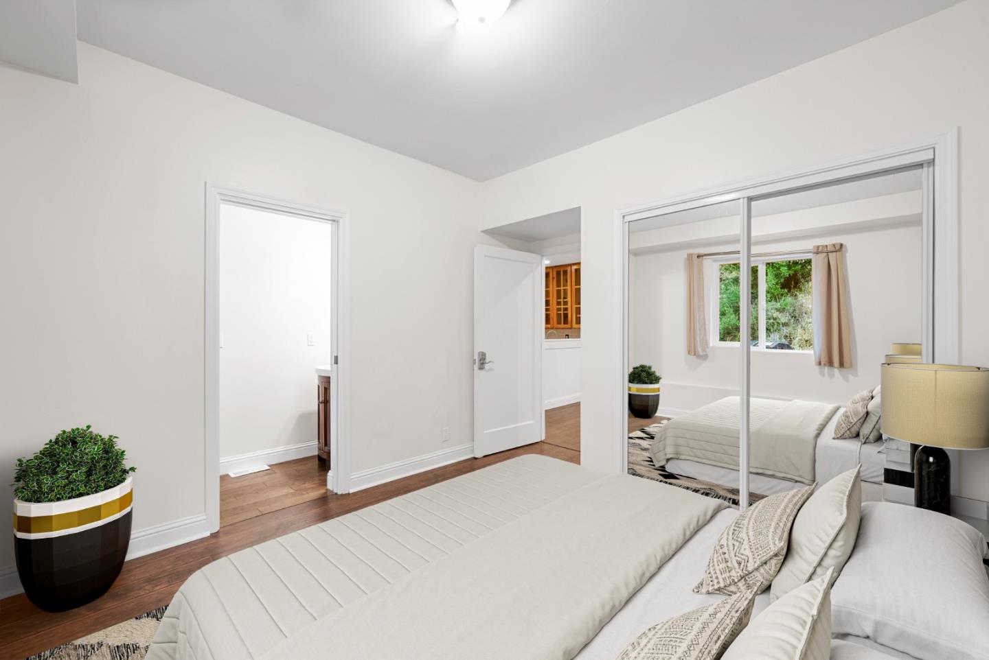 975 Logan Creek Road Boulder Creek, CA 95006 - Photo 29 of 41 a bedroom with a bed and window