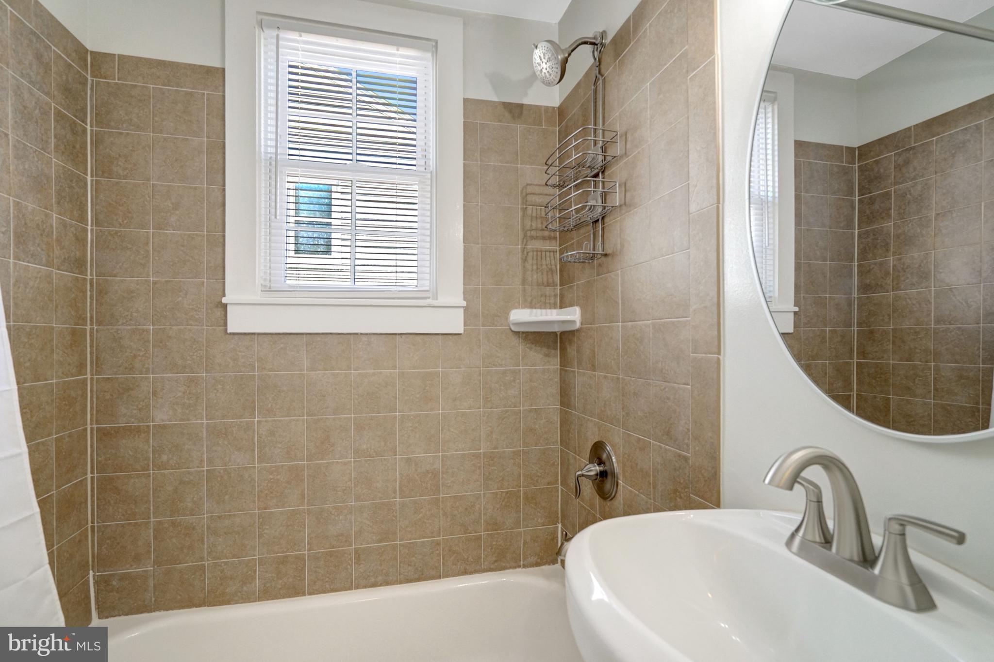 3107 Memorial Street Alexandria, VA 22306 - Photo 22 of 45 Main level full hall bath with updated fixtures