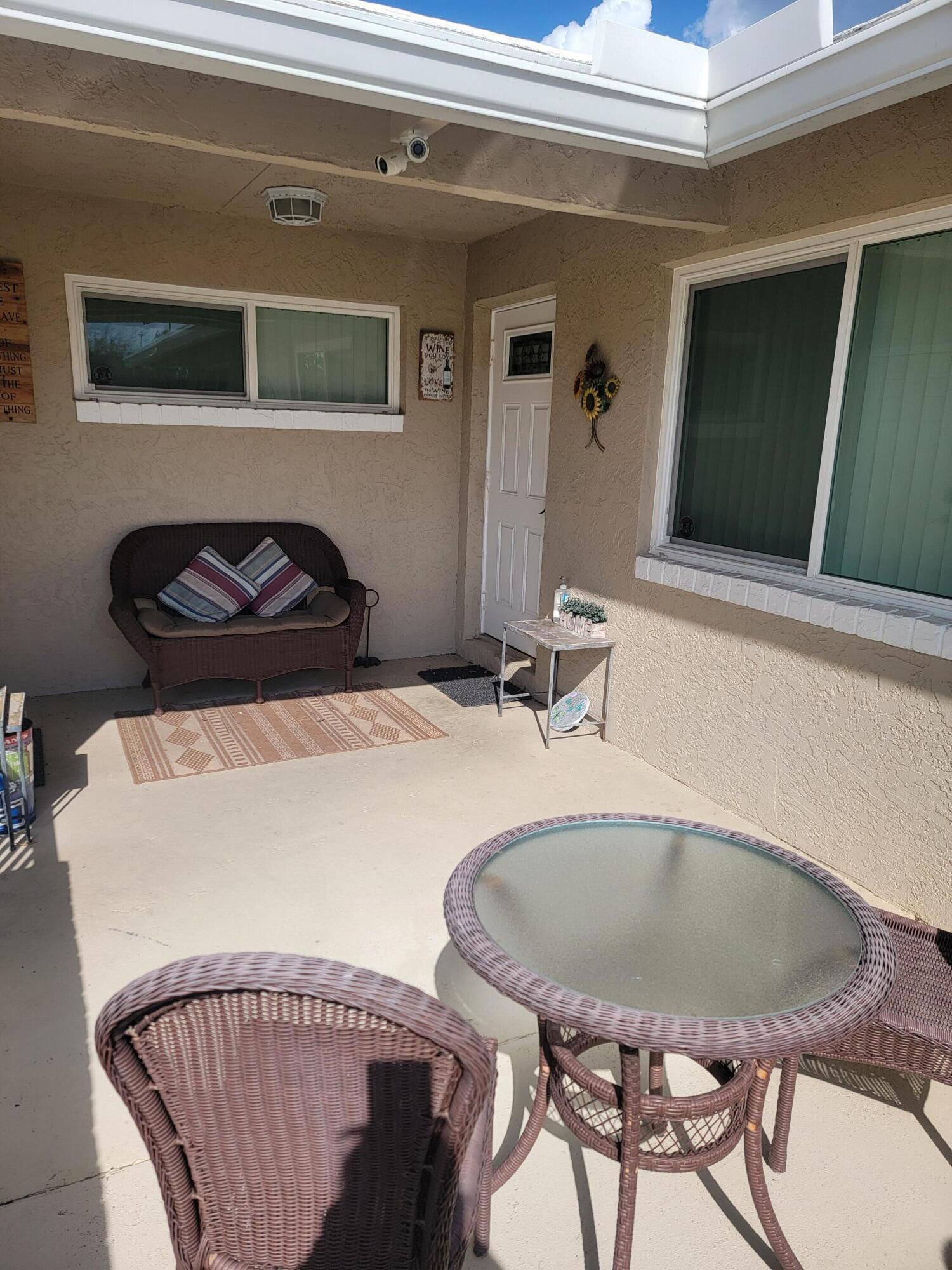 27 Vista Del Rio Boynton Beach, FL 33426 - Photo 10 of 45 Front patio 1