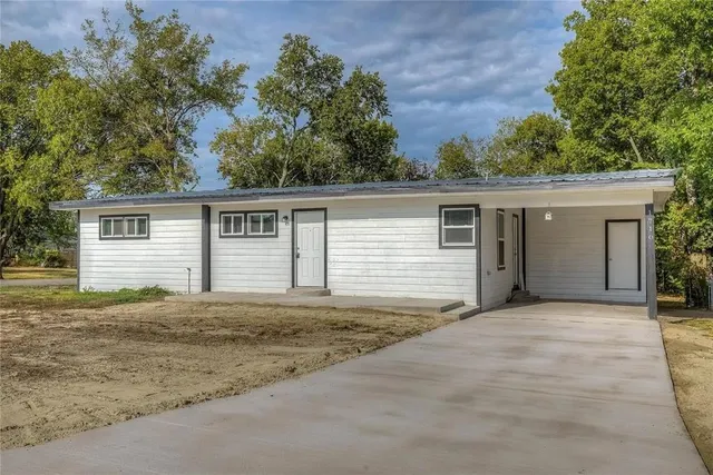 front view of house with a yard