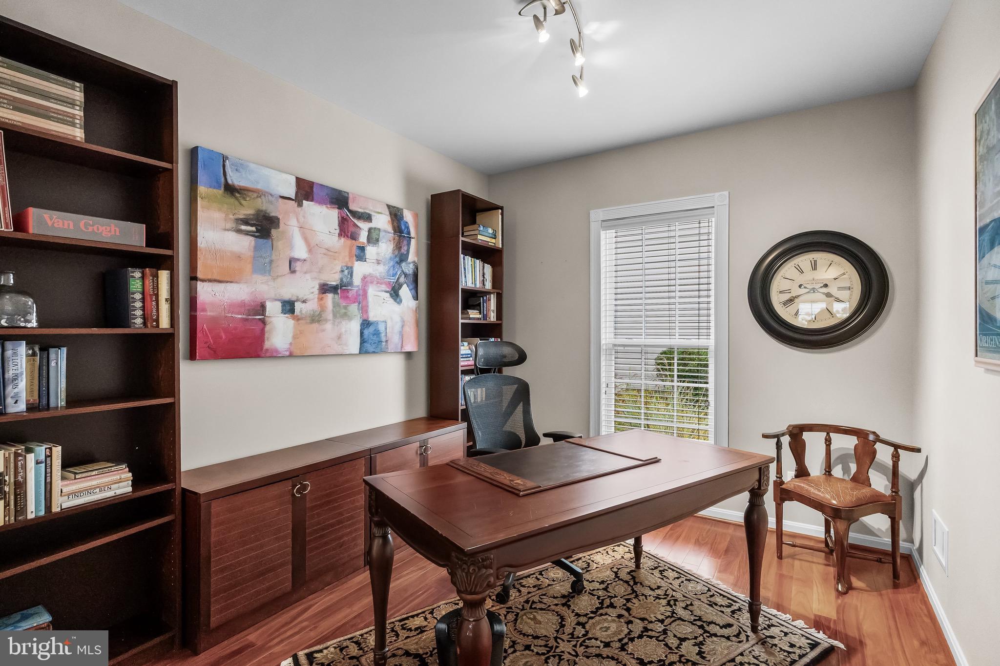 77 Pennington Court Delanco, NJ 08075 - Photo 26 of 46 a view of a livingroom with furniture and bookshelf
