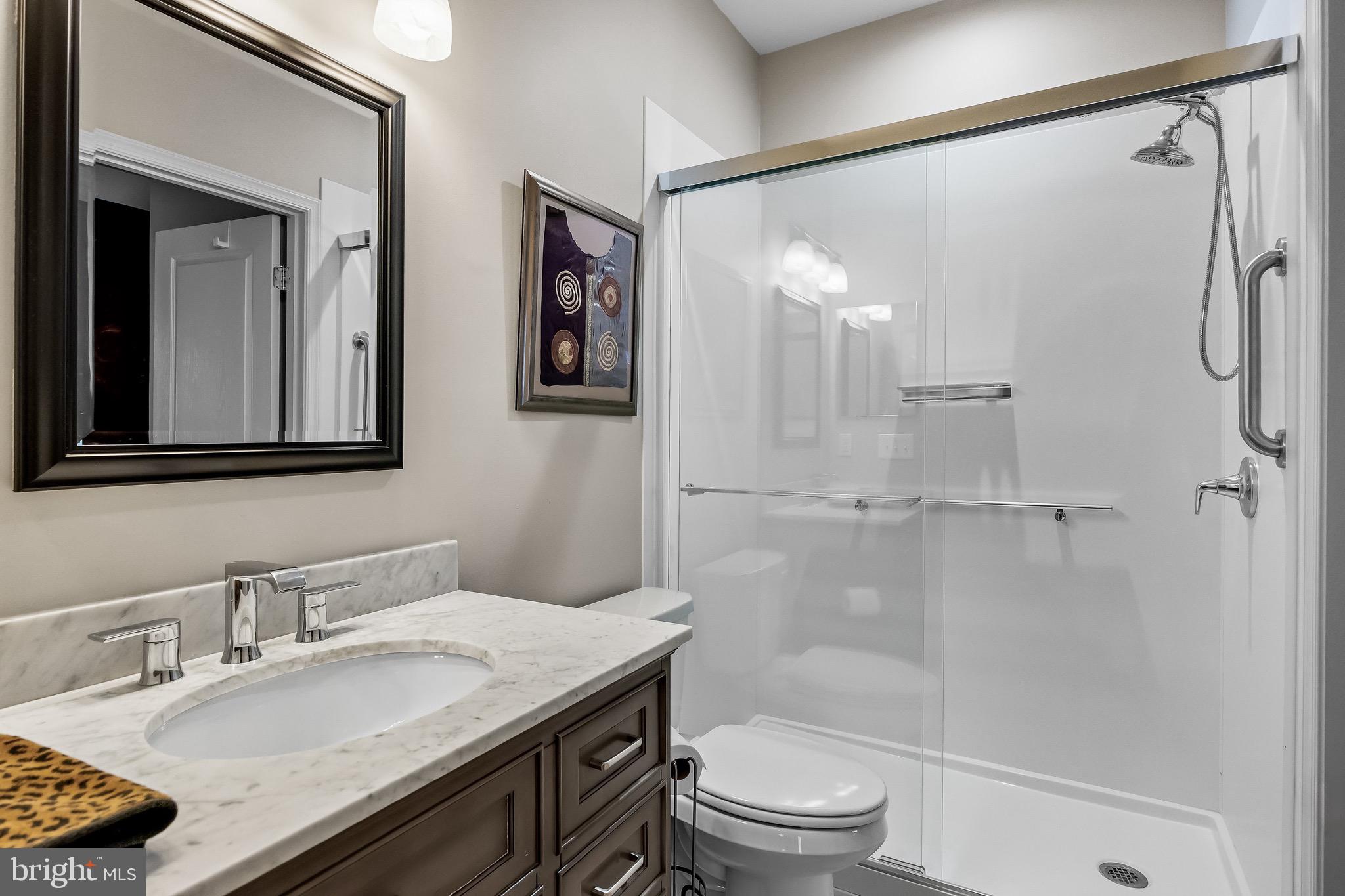77 Pennington Court Delanco, NJ 08075 - Photo 27 of 46 a bathroom with a granite countertop sink toilet and shower