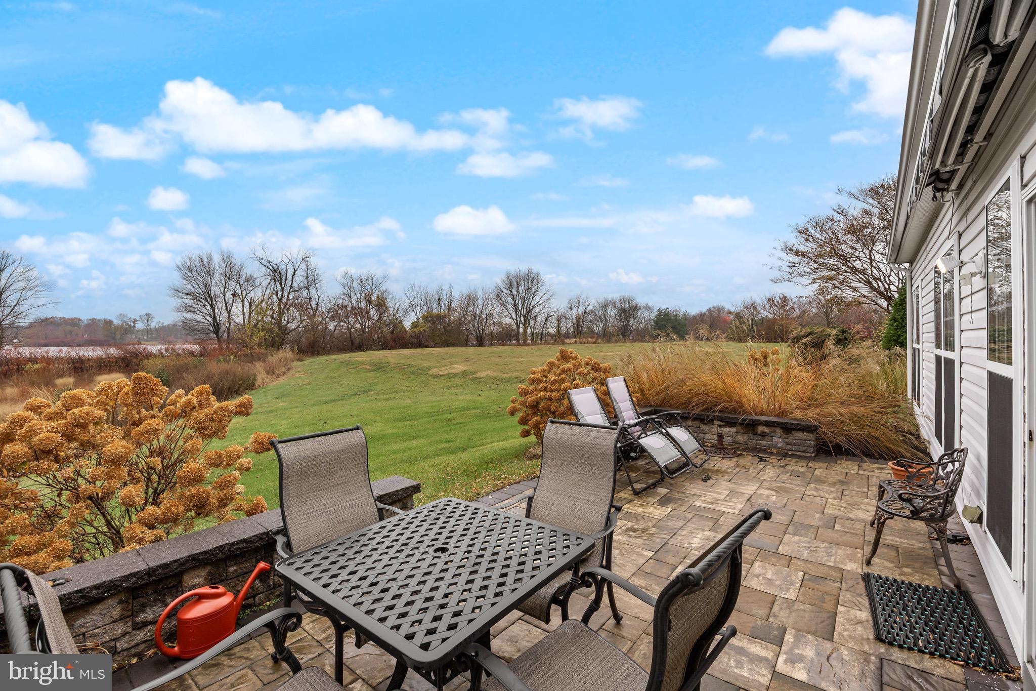 77 Pennington Court Delanco, NJ 08075 - Photo 39 of 46 a view of a terrace with couches and sky view