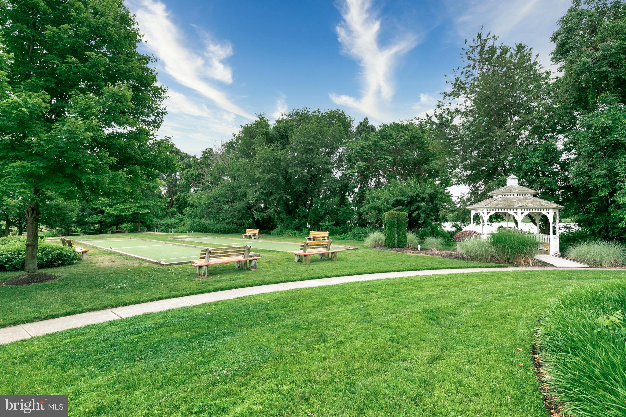 77 Pennington Court Delanco, NJ 08075 - Photo 46 of 46 a view of a house with a big yard and potted plants and large trees