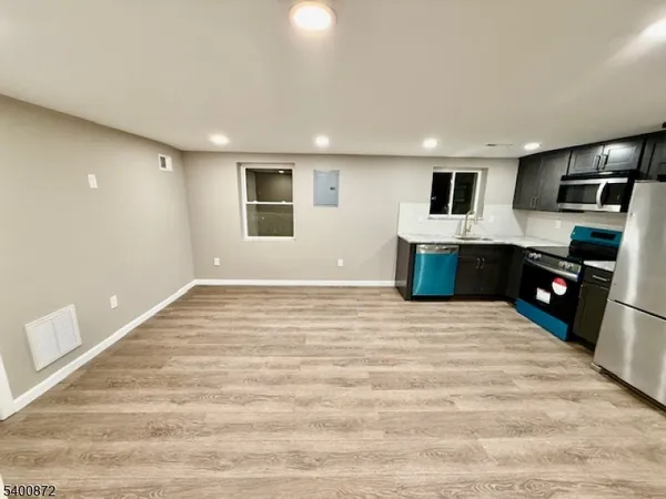 a view of kitchen and microwave
