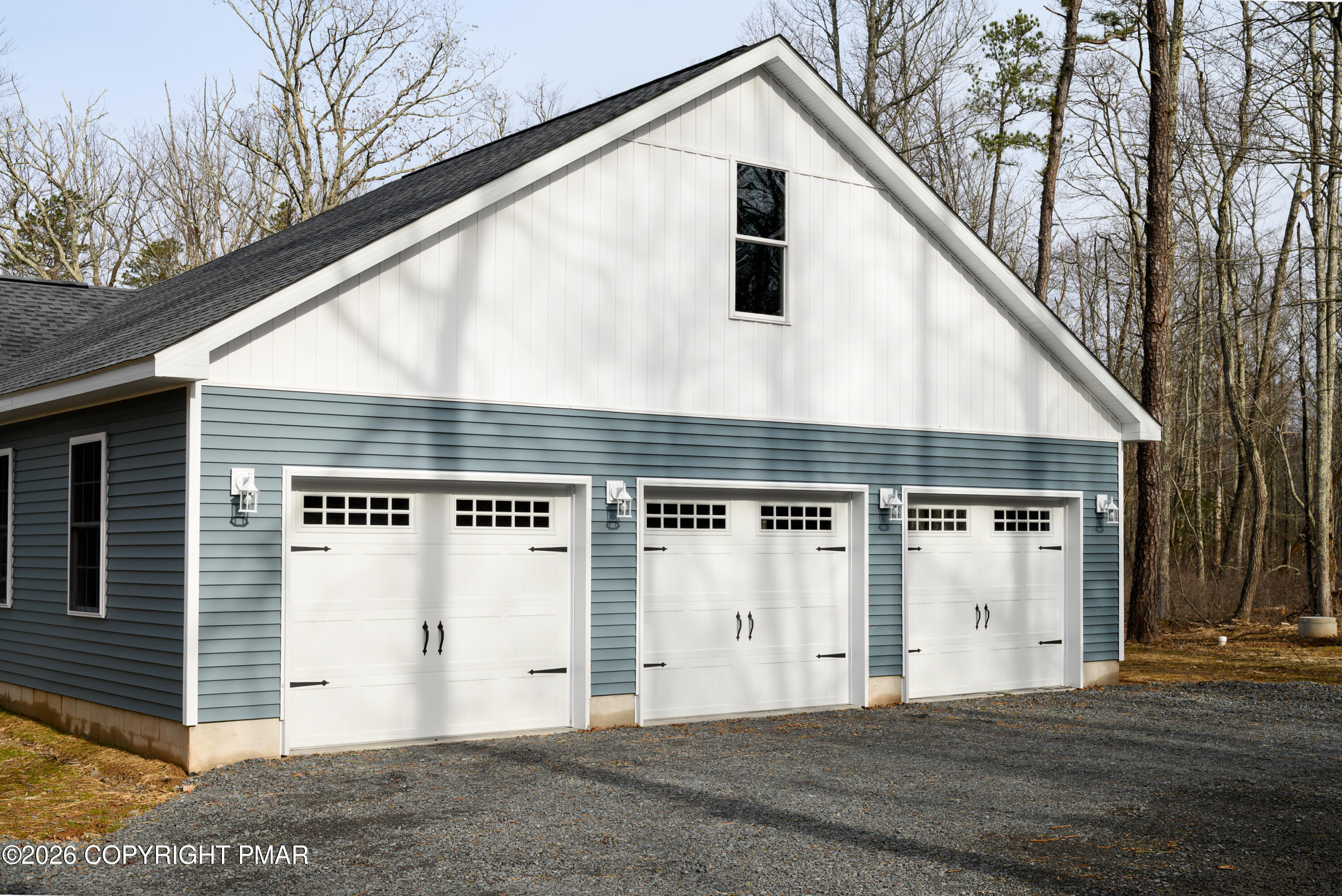 456 Big Oak Road Canadensis, PA 18325 - Photo 6 of 20 a front view of a house with a garage