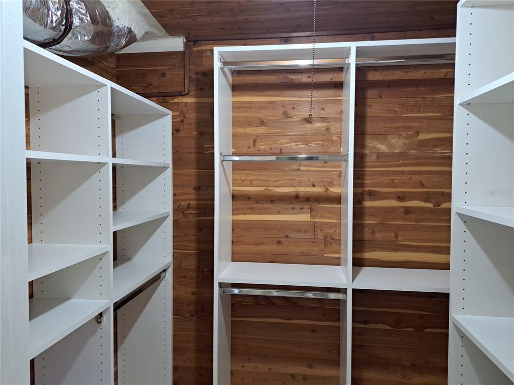 1835 Edwin Boulevard Winter Park, FL 32789 - Photo 26 of 49 a view of walk in closet with empty racks