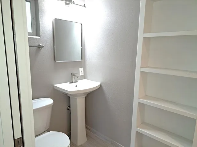 a view of house with trees in the background