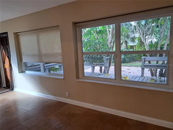 a view of a bench in a patio