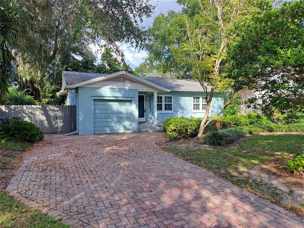 1835 Edwin Boulevard Winter Park, FL 32789 - Photo 6 of 49 a front view of a house with a garden and plants