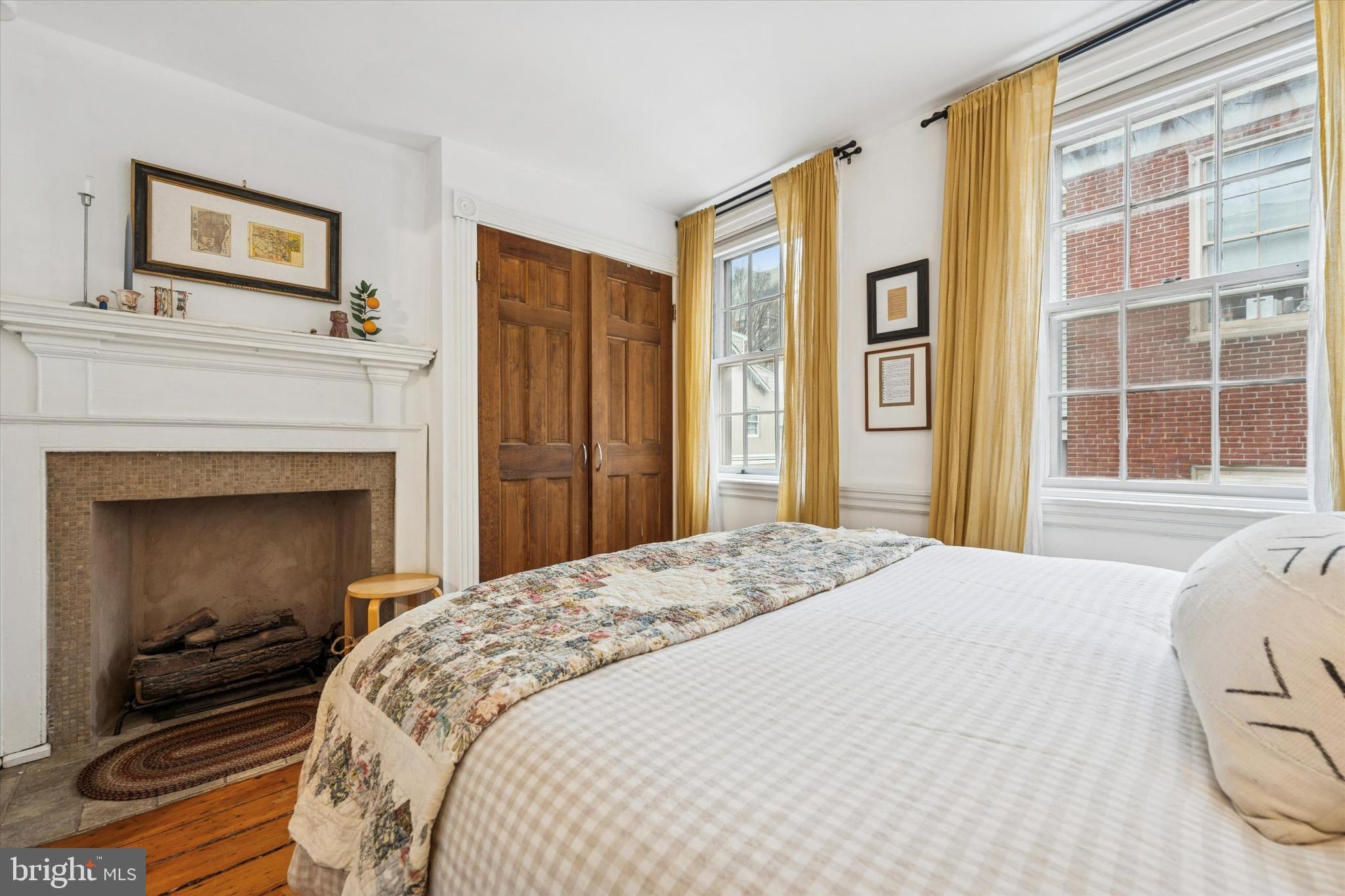 258 Quince Street Philadelphia, PA 19107 - Photo 13 of 29 a bedroom with a bed and a window