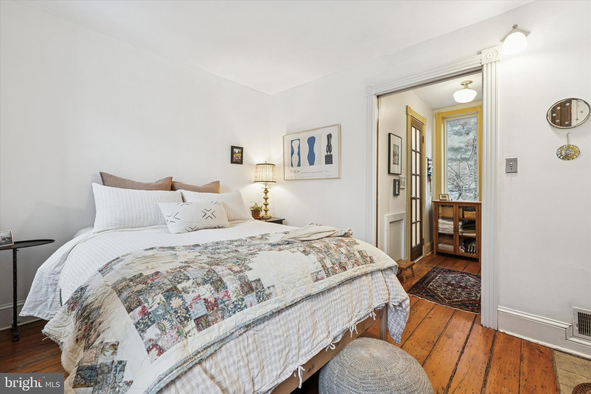 258 Quince Street Philadelphia, PA 19107 - Photo 18 of 29 a bedroom with a bed and a dresser