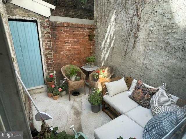 258 Quince Street Philadelphia, PA 19107 - Photo 28 of 29 a view of backyard with furniture and outdoor seating