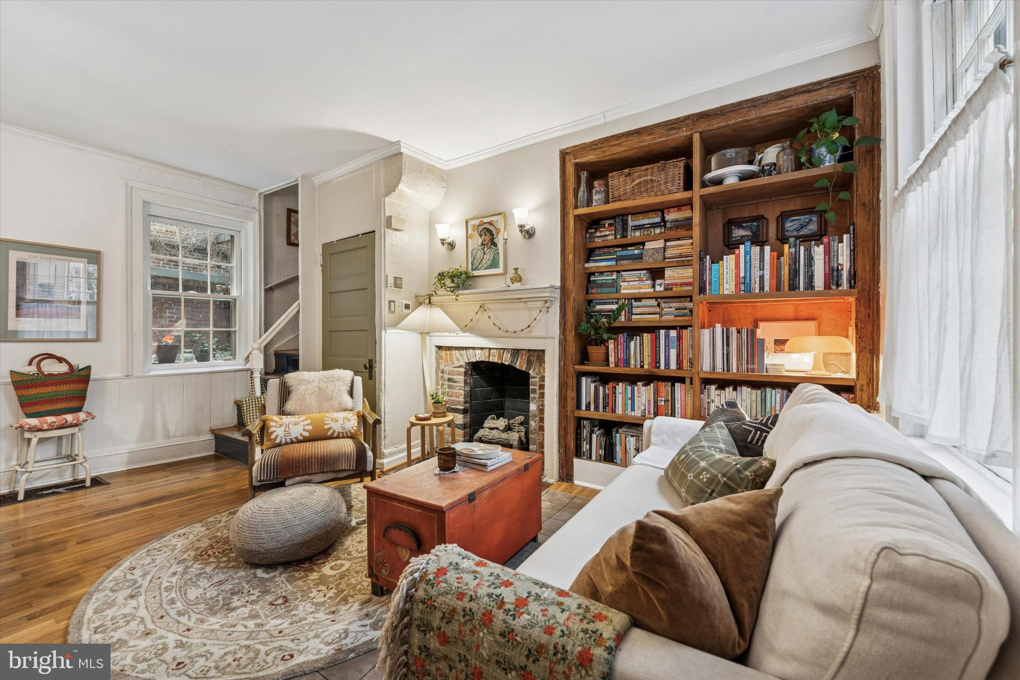 258 Quince Street Philadelphia, PA 19107 - Photo 3 of 29 a living room with furniture or couch and a bookshelf