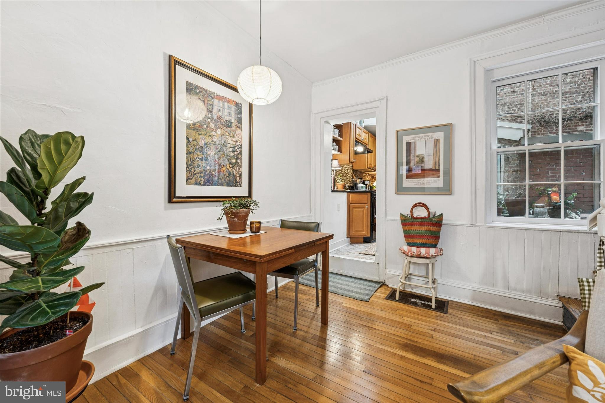 258 Quince Street Philadelphia, PA 19107 - Photo 7 of 29 a view of a workspace with furniture and a potted plant
