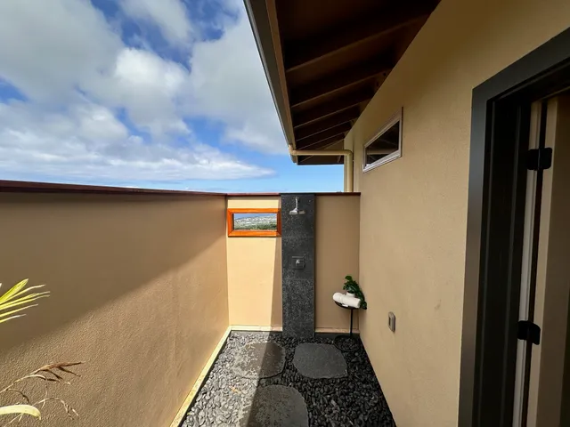 a large bathroom with a double vanity sink and a mirror