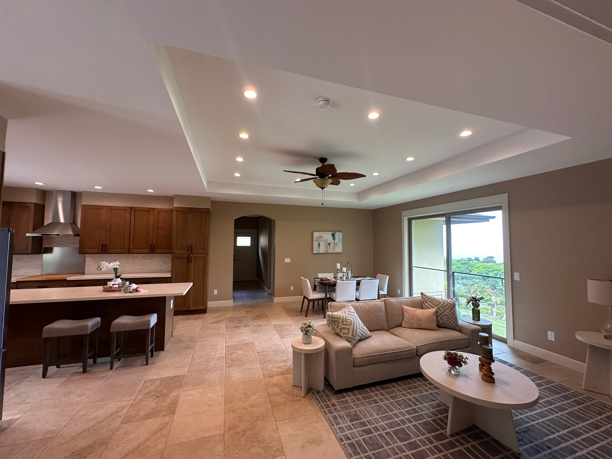 75-2620 Keopu Lani Road Holualoa, HI 96725 - Photo 17 of 30 a living room with furniture and a large window