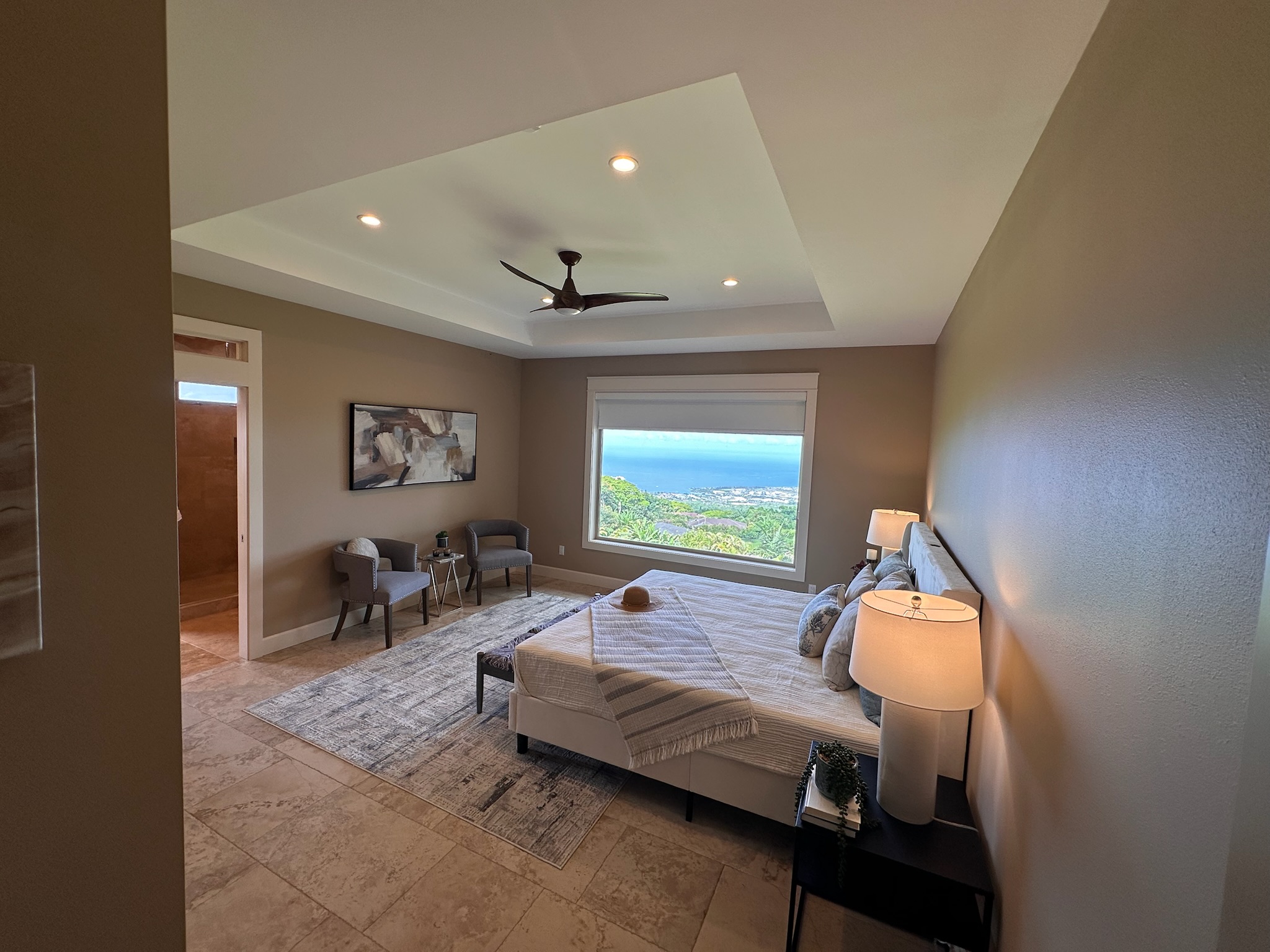 75-2620 Keopu Lani Road Holualoa, HI 96725 - Photo 20 of 30 a living room with furniture and a flat screen tv